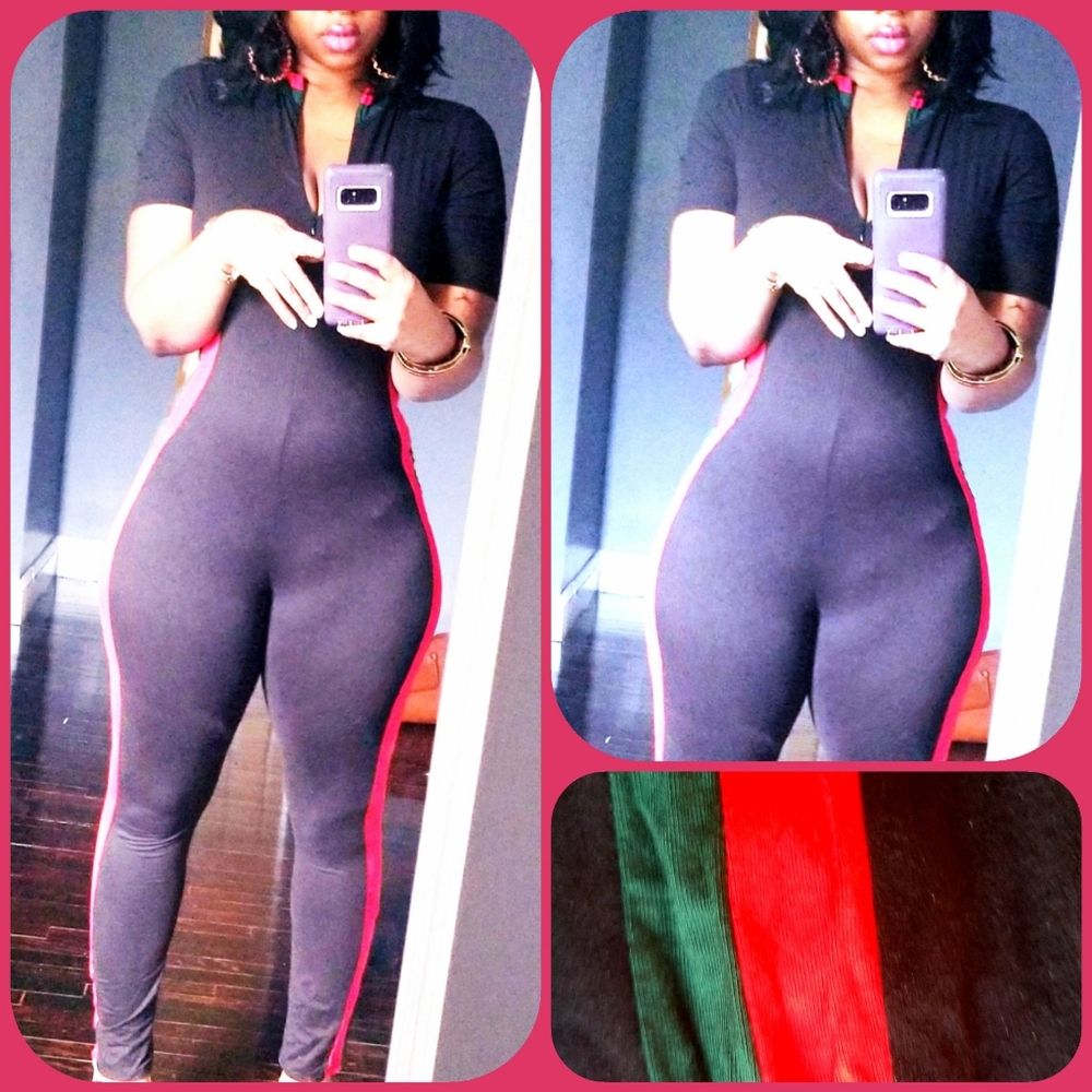 Jumpsuit.  Black with red and green strip